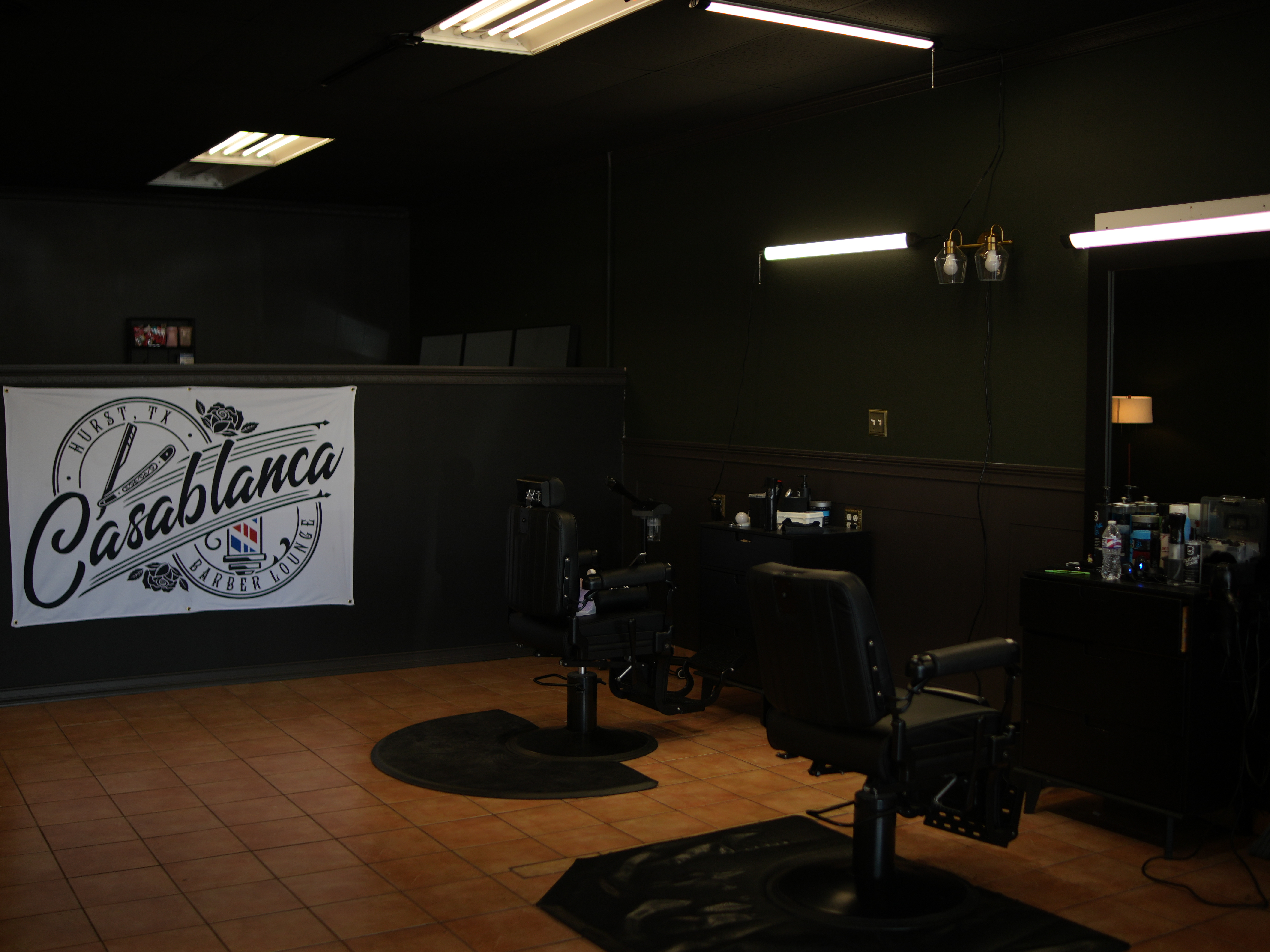 Remodeled Hurst lounge with barber chairs and the Casablanca sign